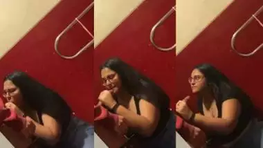 Chubby girl gives an outdoor blowjob in a cinema theatre